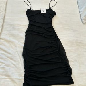 Forever 21 black knit dress. Size Medium. New with tags.